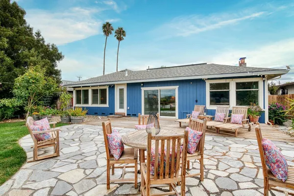 a view of a swimming pool with a patio