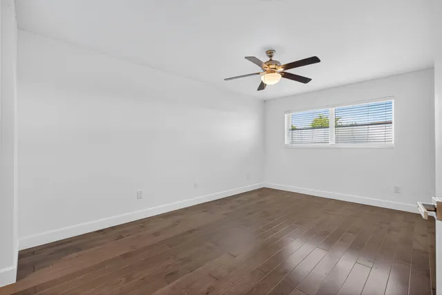 a view of a bathroom from a hallway