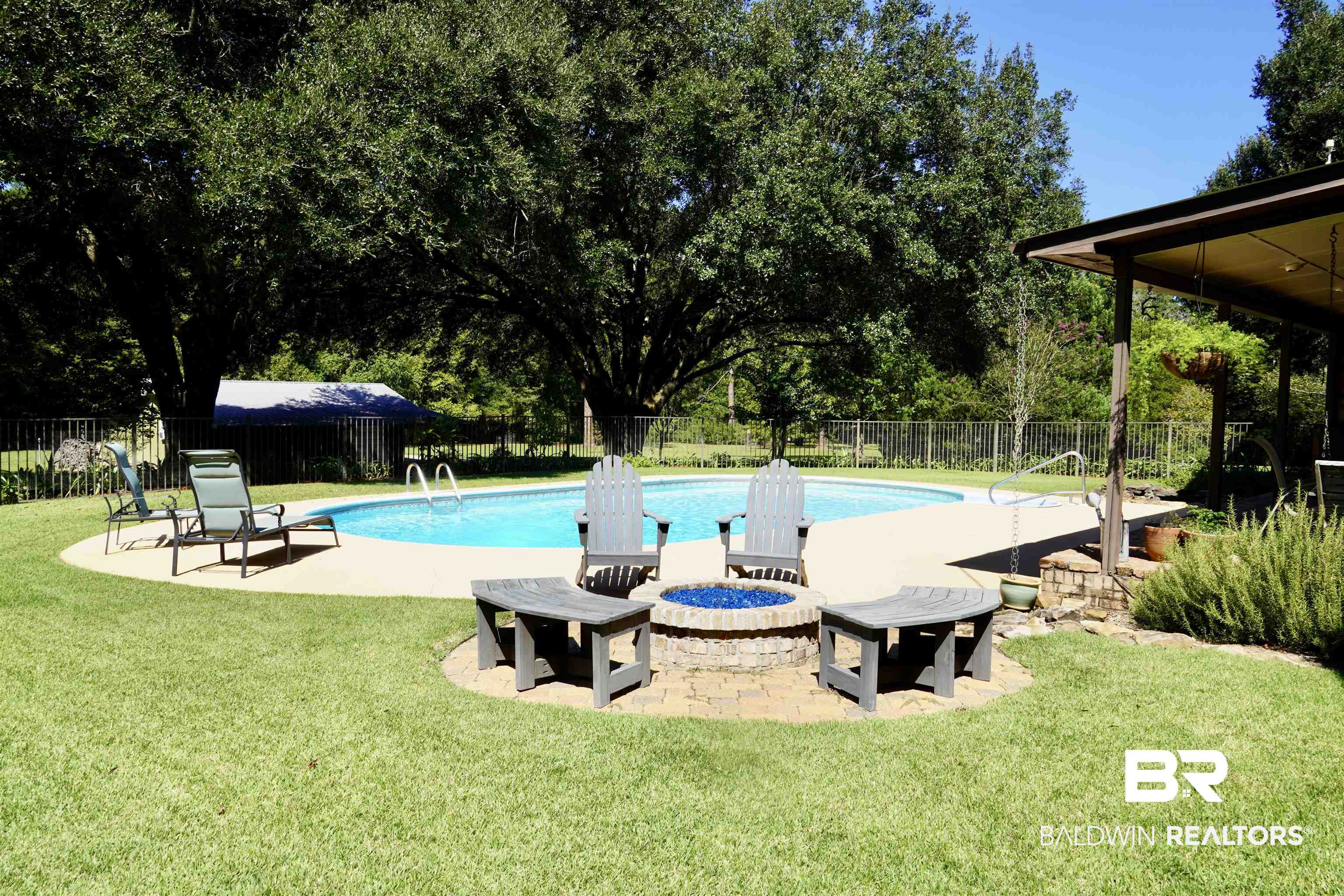 117 Belle Meade Brewton, AL 36426 - Photo 38 of 62 View of pool featuring a yard, a patio, and an outdoor fire pit