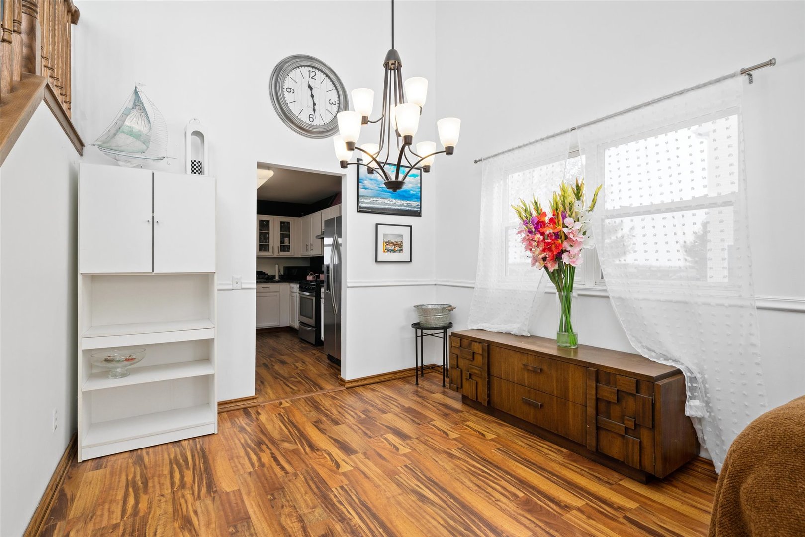 376 Brookhaven Circle Sugar Grove, IL 60554 - Photo 13 of 33 a living room with furniture and a chandelier