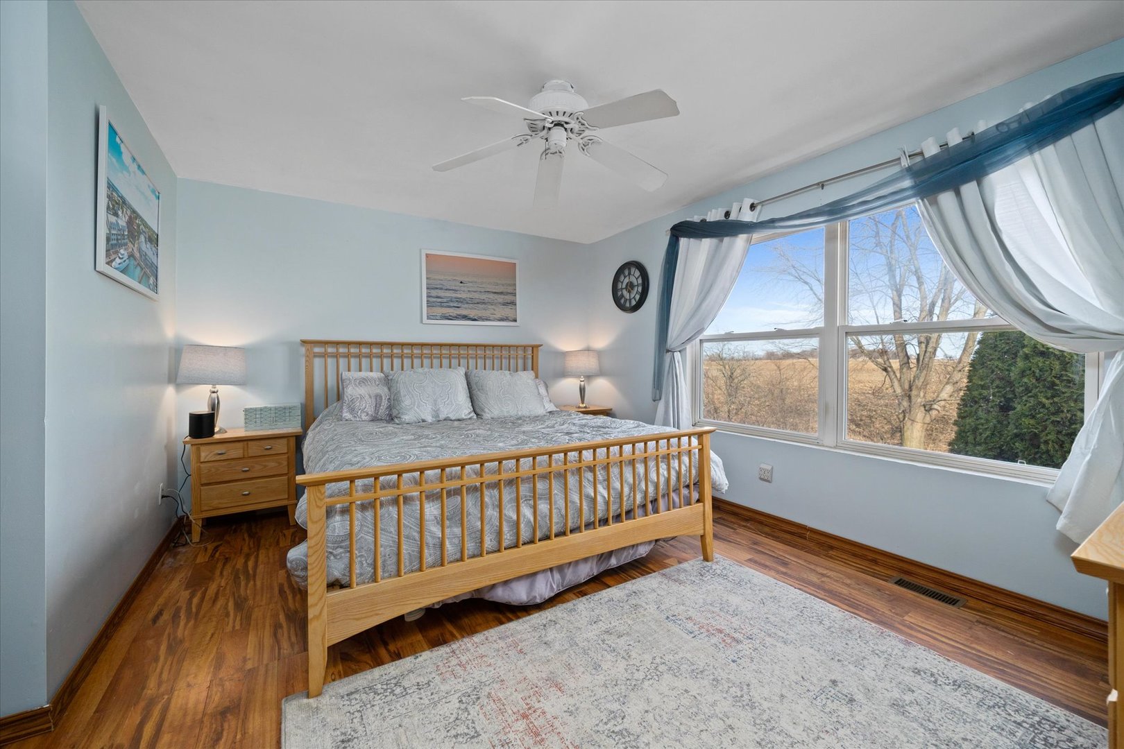 376 Brookhaven Circle Sugar Grove, IL 60554 - Photo 17 of 33 a bedroom with a bed and a large window