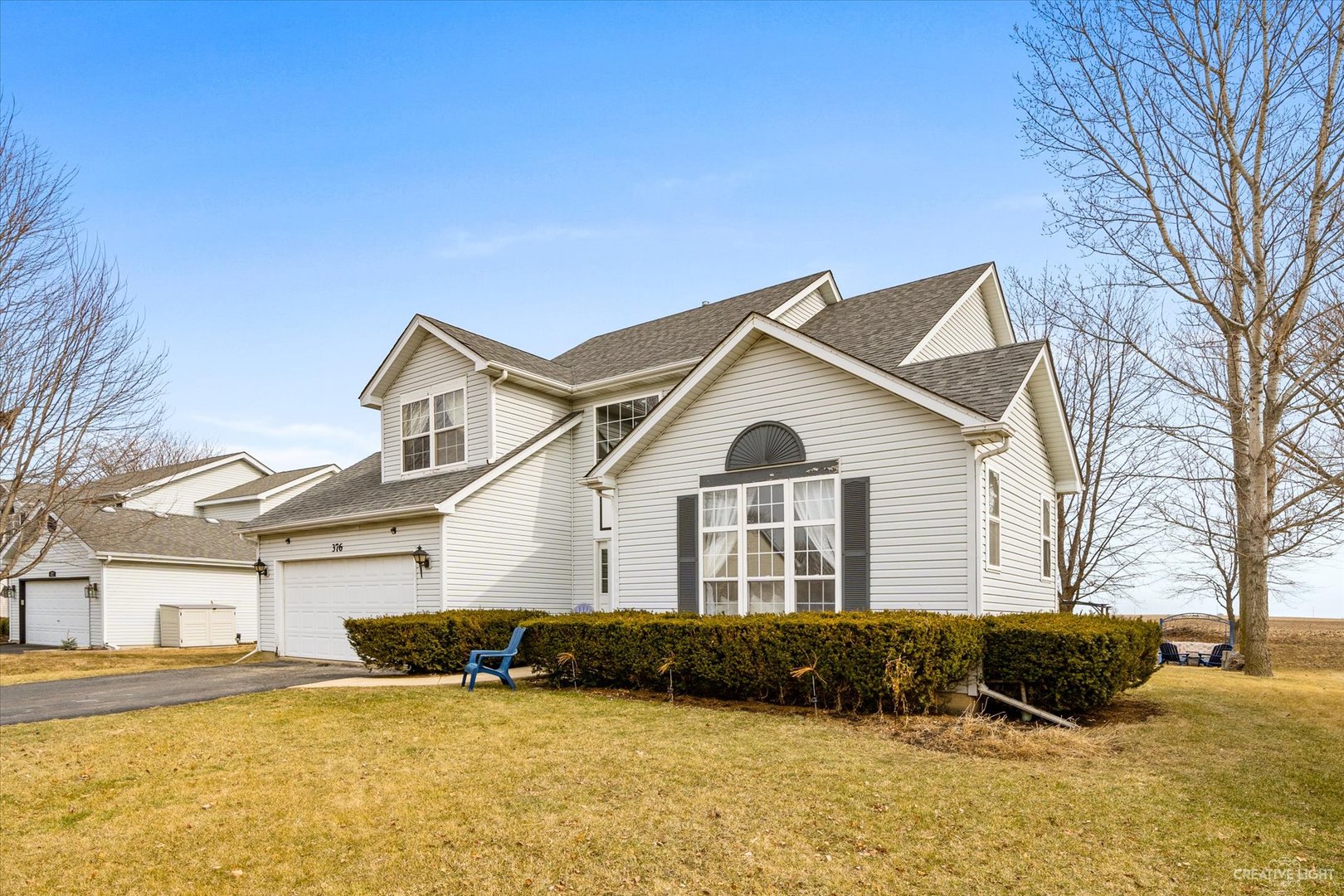 376 Brookhaven Circle Sugar Grove, IL 60554 - Photo 2 of 33 a view of a house with a yard covered with snow
