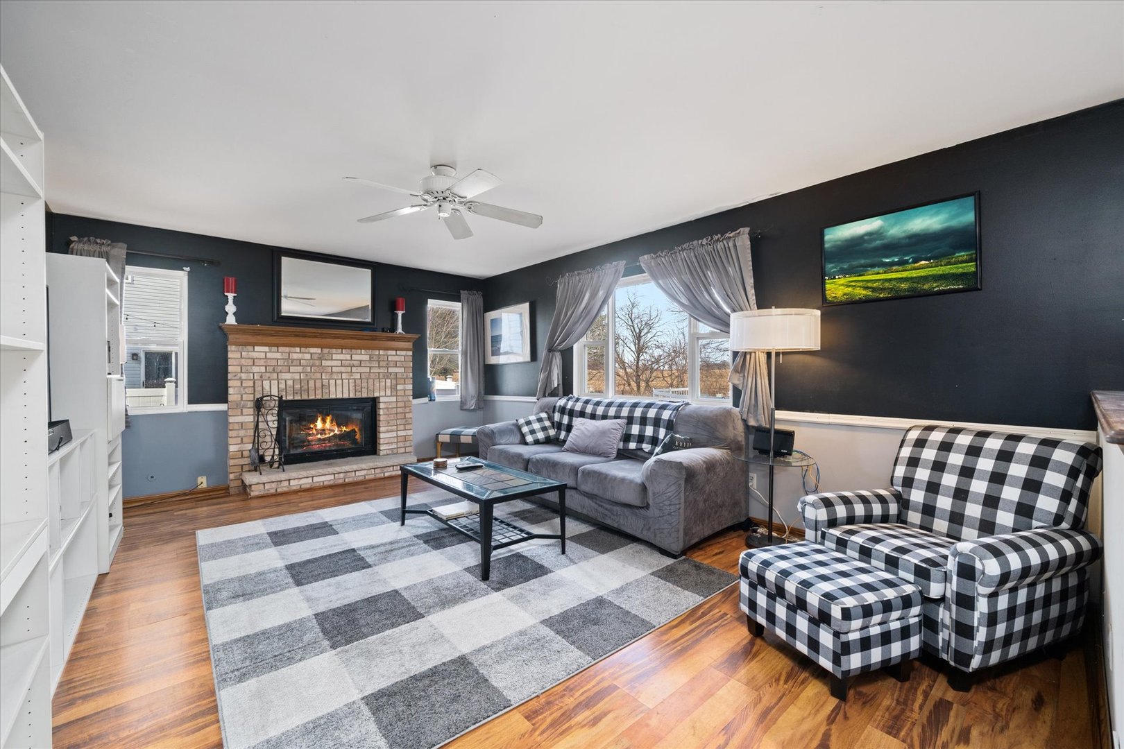 376 Brookhaven Circle Sugar Grove, IL 60554 - Photo 7 of 33 a living room with furniture and a fireplace