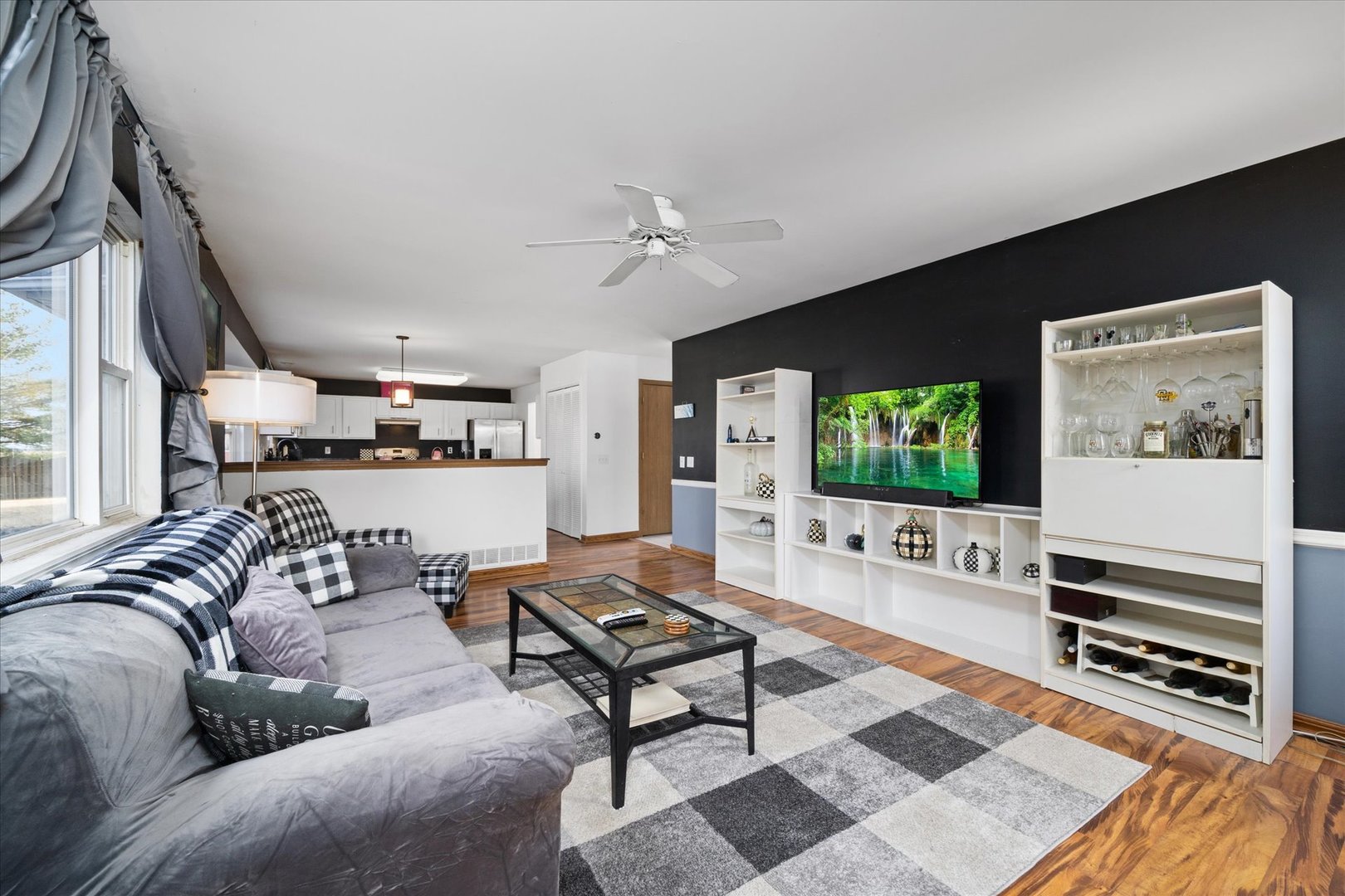 376 Brookhaven Circle Sugar Grove, IL 60554 - Photo 8 of 33 a living room with furniture and a flat screen tv