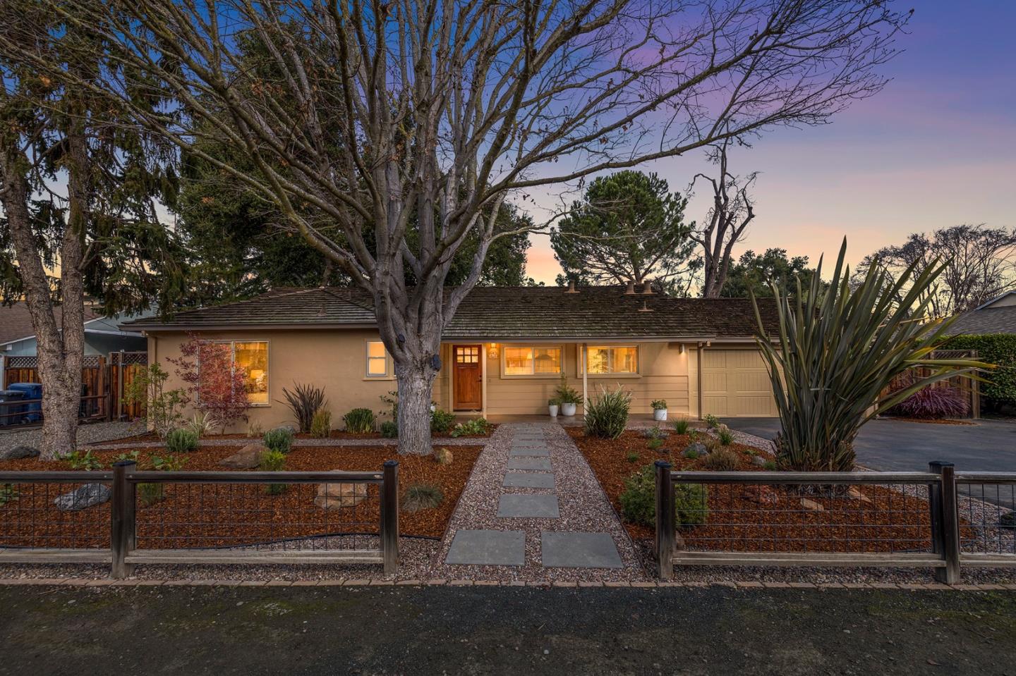 671 Covington Road Los Altos, CA 94024 - Photo 1 of 38 a view of outdoor space with deck and tree