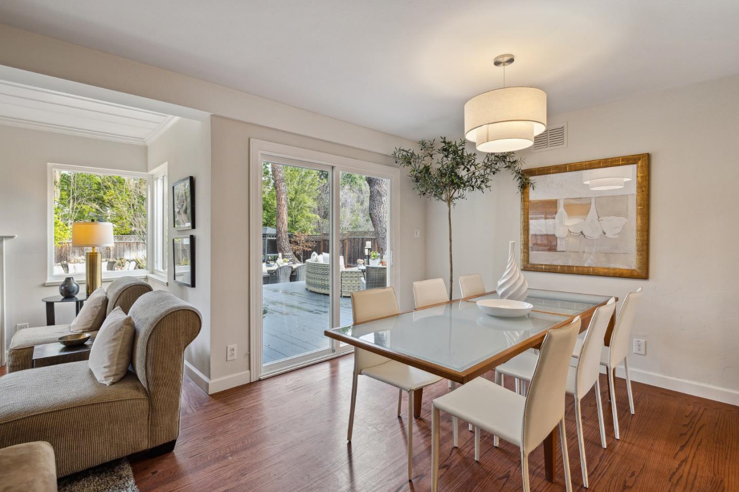 671 Covington Road Los Altos, CA 94024 - Photo 12 of 38 a view of a dining room with furniture window and wooden floor