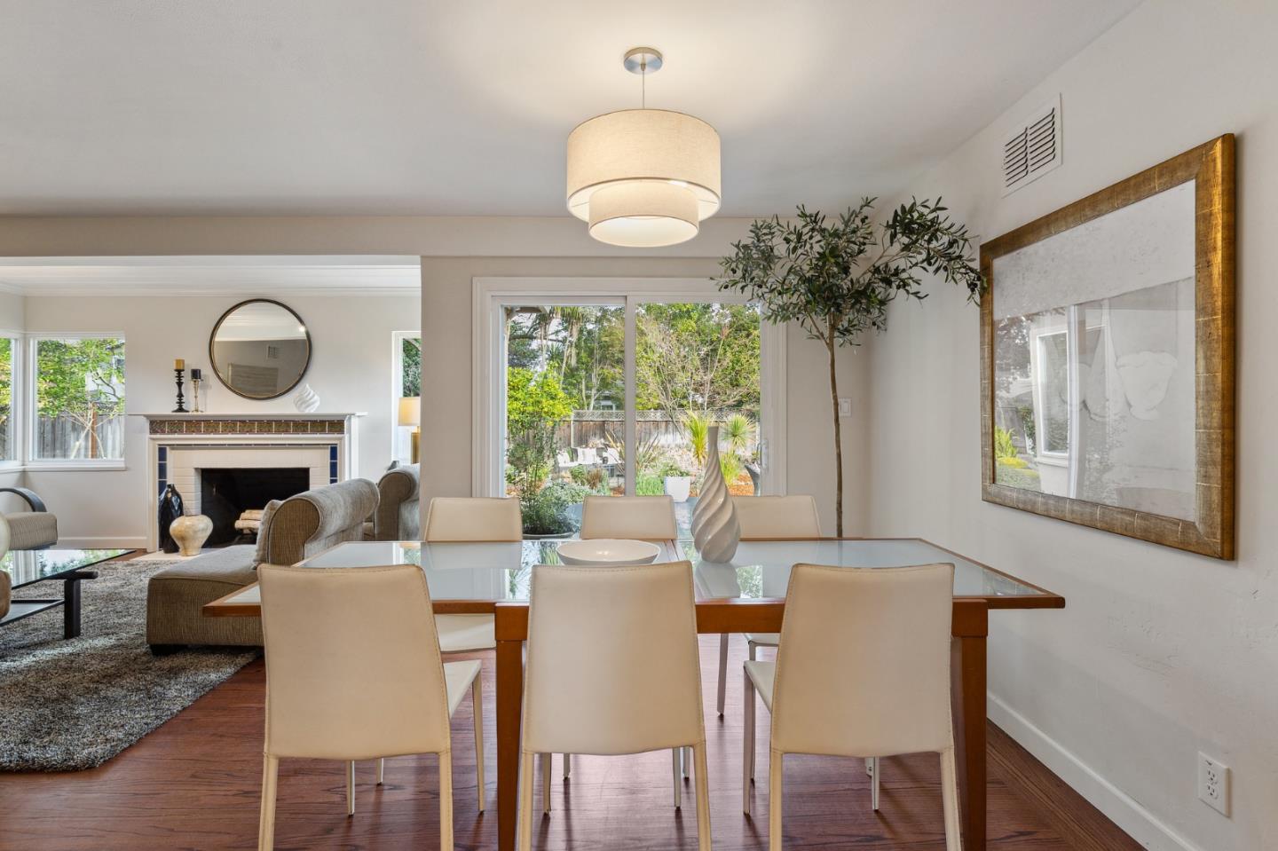 671 Covington Road Los Altos, CA 94024 - Photo 13 of 38 a view of a dining room with furniture window and wooden floor