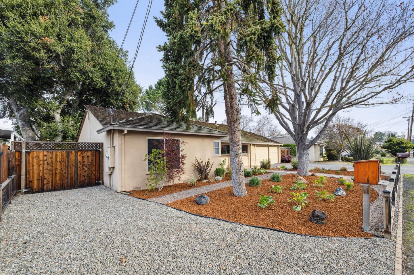 671 Covington Road Los Altos, CA 94024 - Photo 2 of 38 front view of a house with a yard