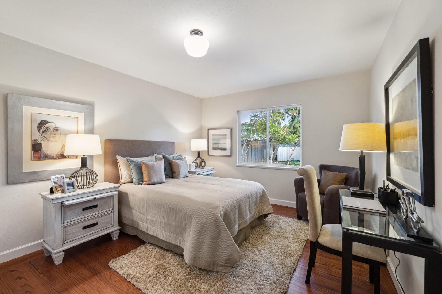 671 Covington Road Los Altos, CA 94024 - Photo 29 of 38 a bedroom with a bed furniture and a window