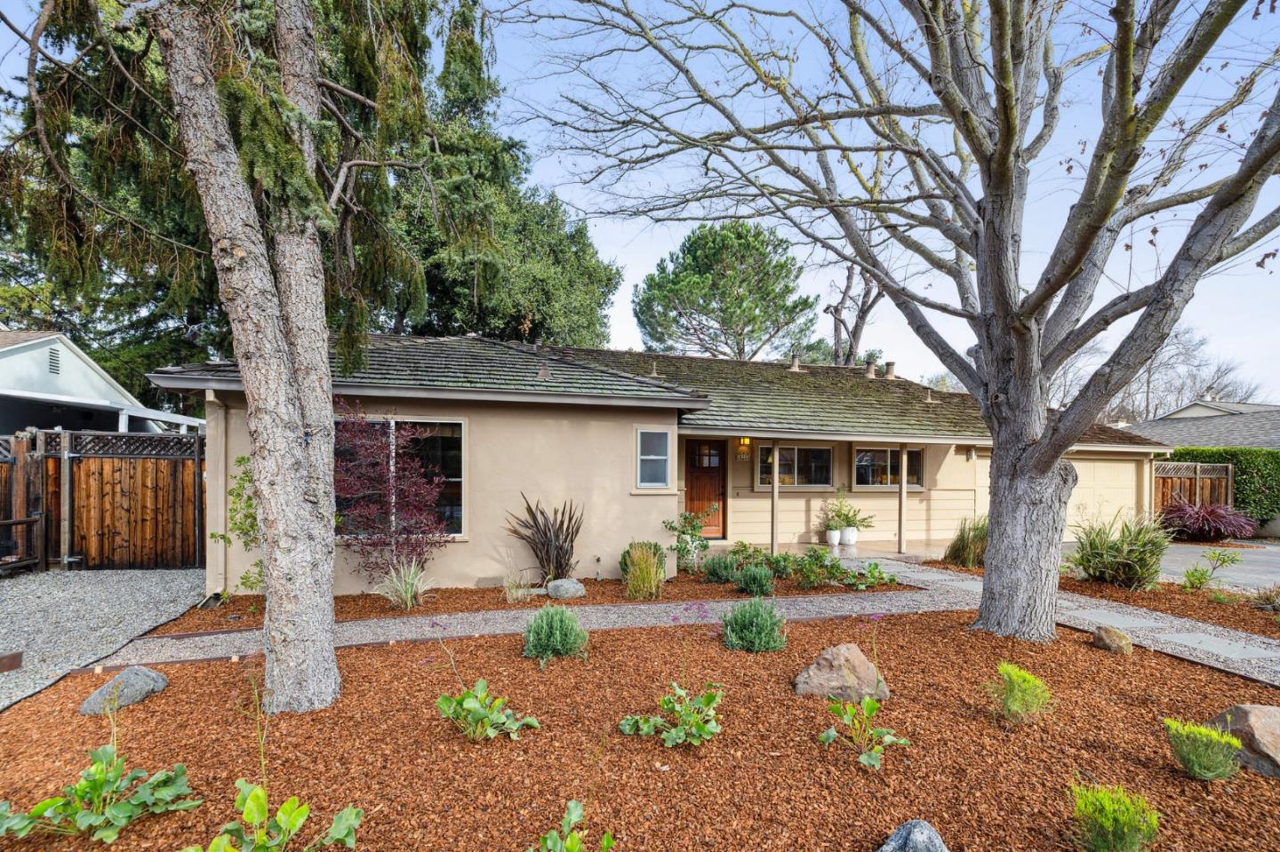 671 Covington Road Los Altos, CA 94024 - Photo 3 of 38 a front view of a house with garden