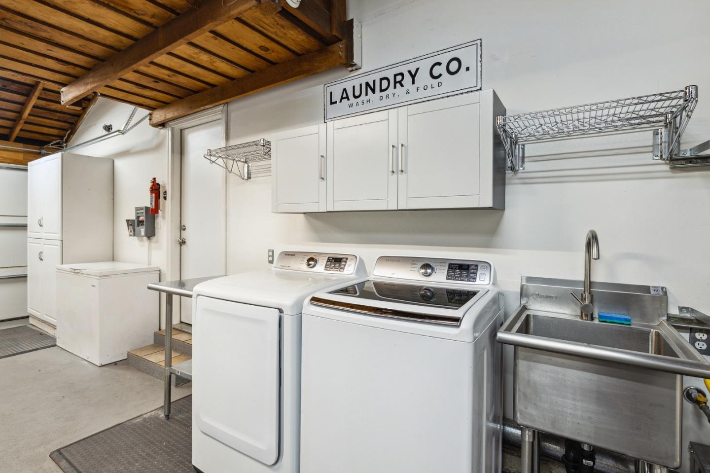671 Covington Road Los Altos, CA 94024 - Photo 31 of 38 a room with a stove and a refrigerator