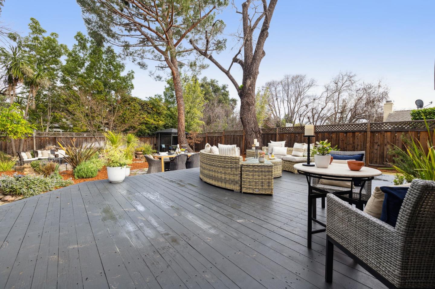 671 Covington Road Los Altos, CA 94024 - Photo 33 of 38 a view of a patio with couches chairs and a wooden floor