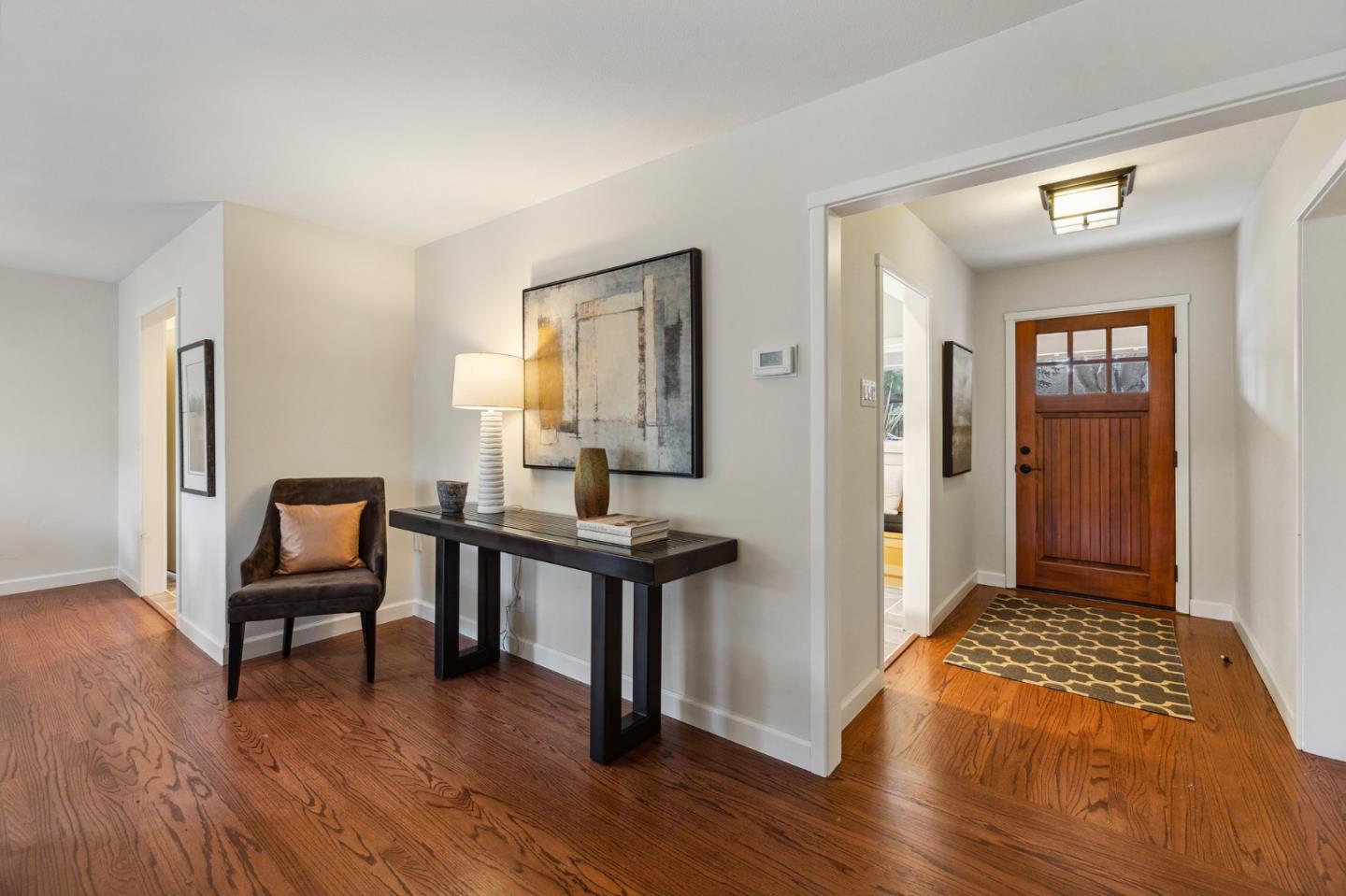 671 Covington Road Los Altos, CA 94024 - Photo 7 of 38 a view of a room with wooden floor and furniture