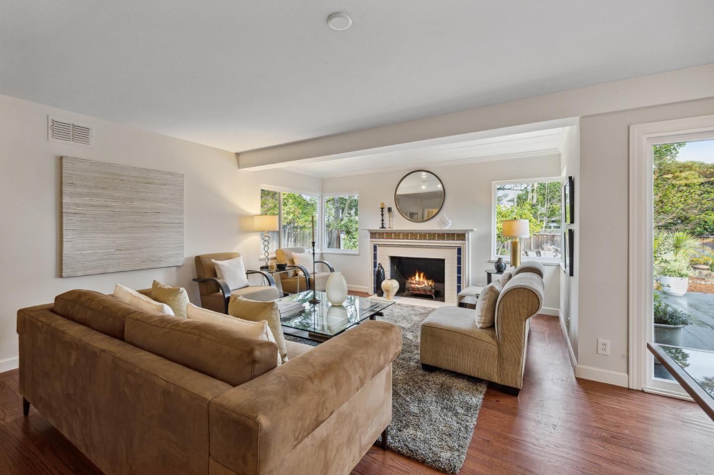 671 Covington Road Los Altos, CA 94024 - Photo 10 of 38 a living room with furniture and a fireplace