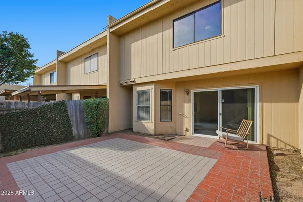 a view of a house with backyard