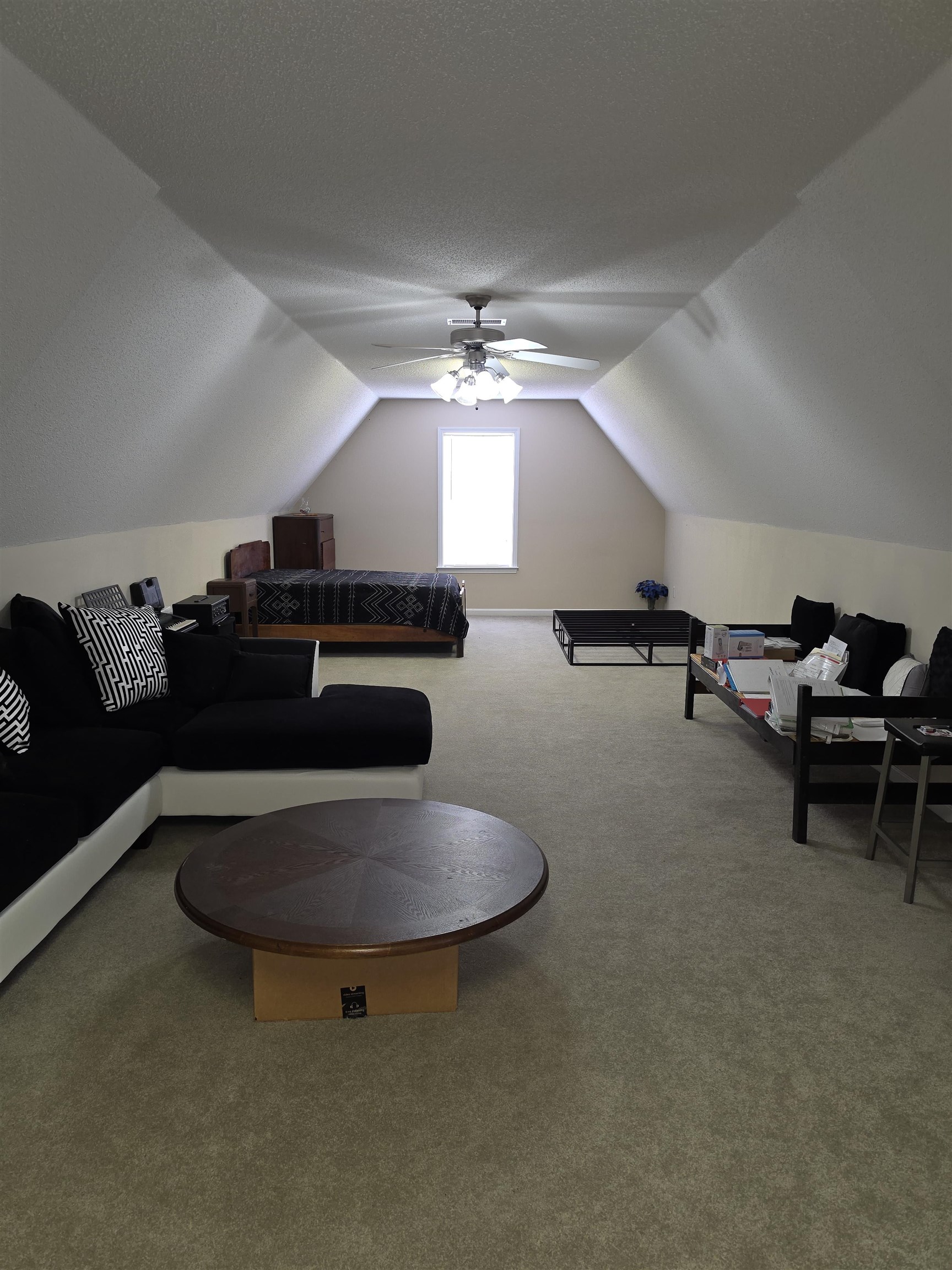 7253 Rourke Circle Memphis, TN 38125 - Photo 23 of 31 Spacious room with sloped ceilings and light-colored carpeting