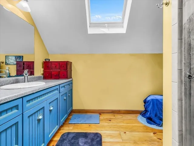 a kitchen with a sink and a large window