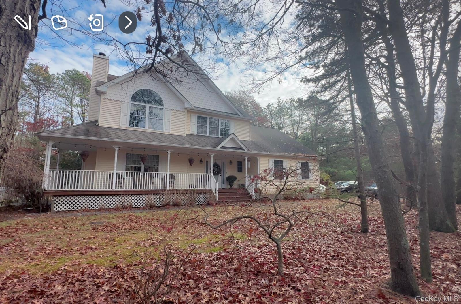 43 North Cozine Road Manorville, NY 11949 - Photo 1 of 42 Farmhouse inspired home featuring covered porch, a chimney, and roof with shingles