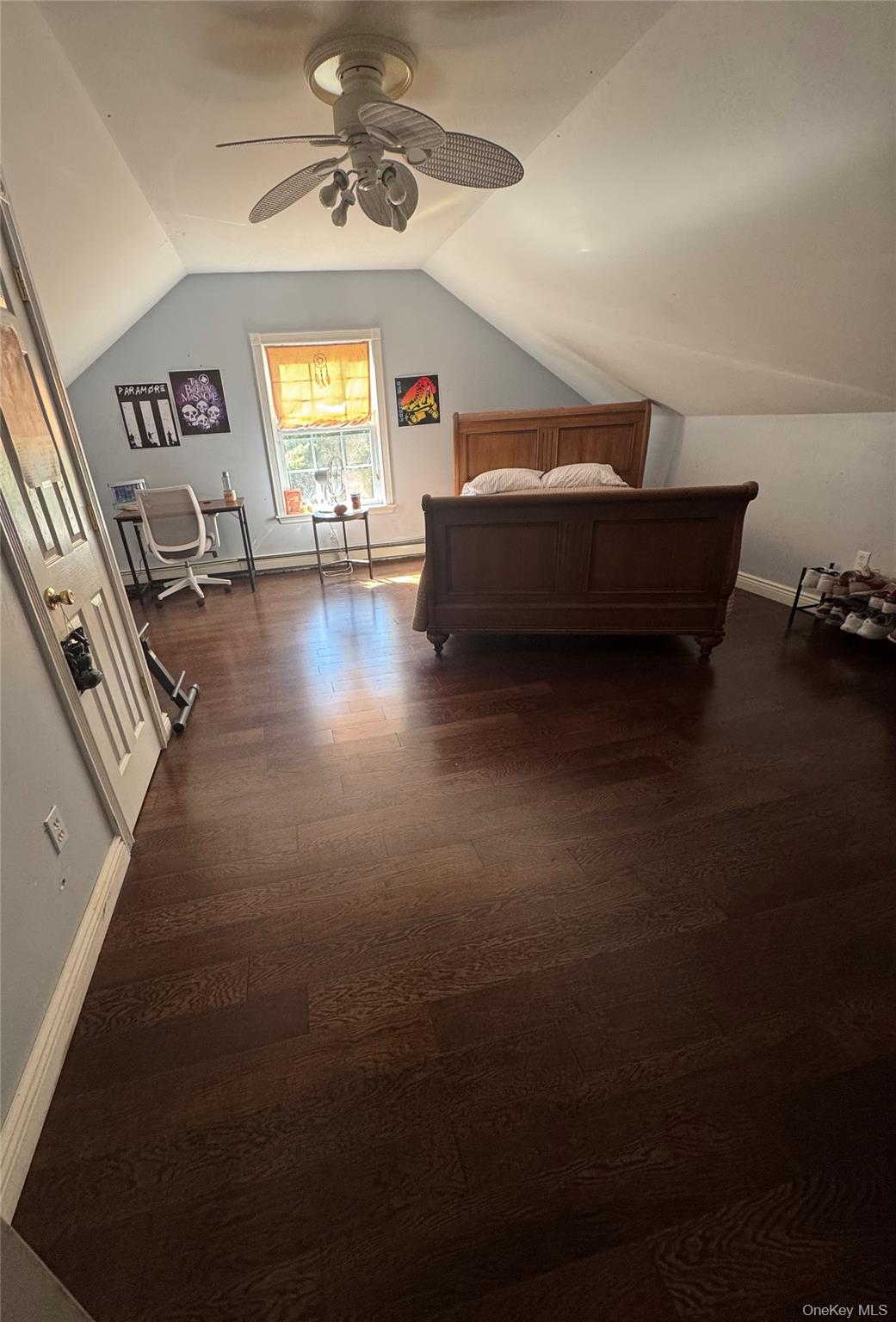 43 North Cozine Road Manorville, NY 11949 - Photo 20 of 42 Bedroom with lofted ceiling, ceiling fan, baseboard heating, and dark wood-style floors