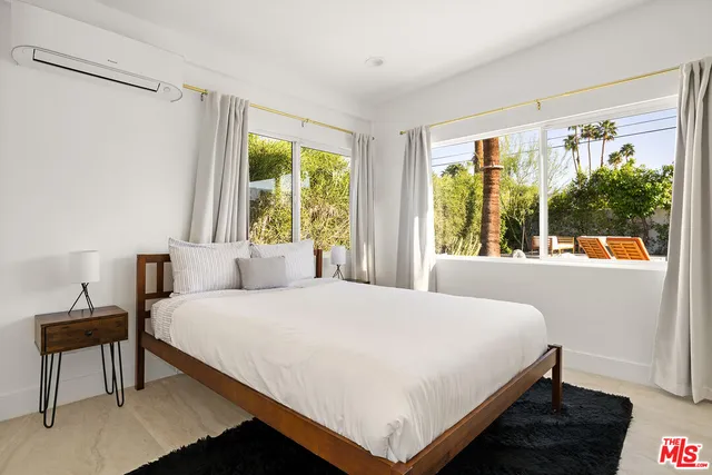 a bathroom with a sink and a shower