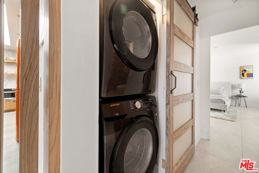 74085 Setting Sun Trail Palm Desert, CA 92260 - Photo 31 of 52 a utility room with dryer and washer