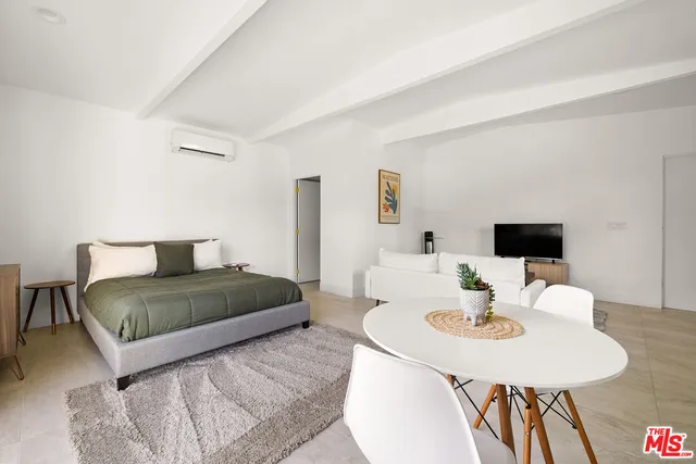 a view of a swimming pool with a chair