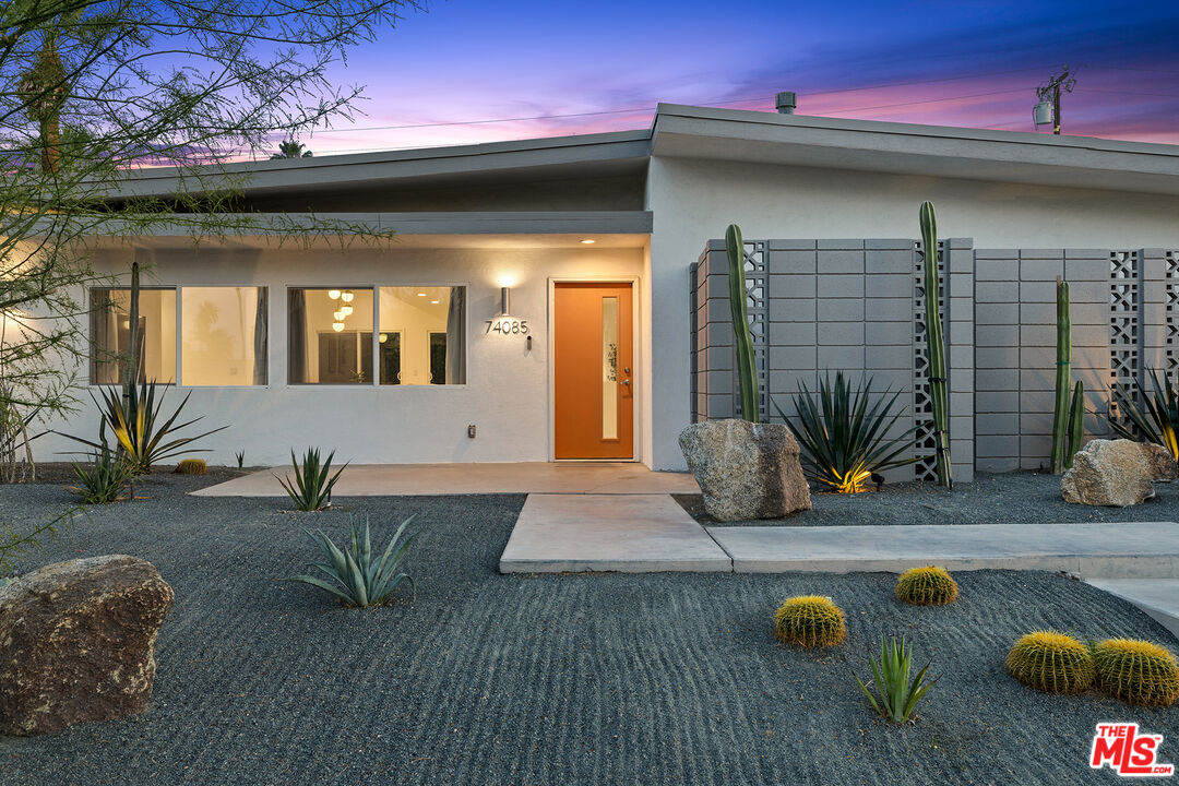 74085 Setting Sun Trail Palm Desert, CA 92260 - Photo 47 of 52 a view of house with outdoor space