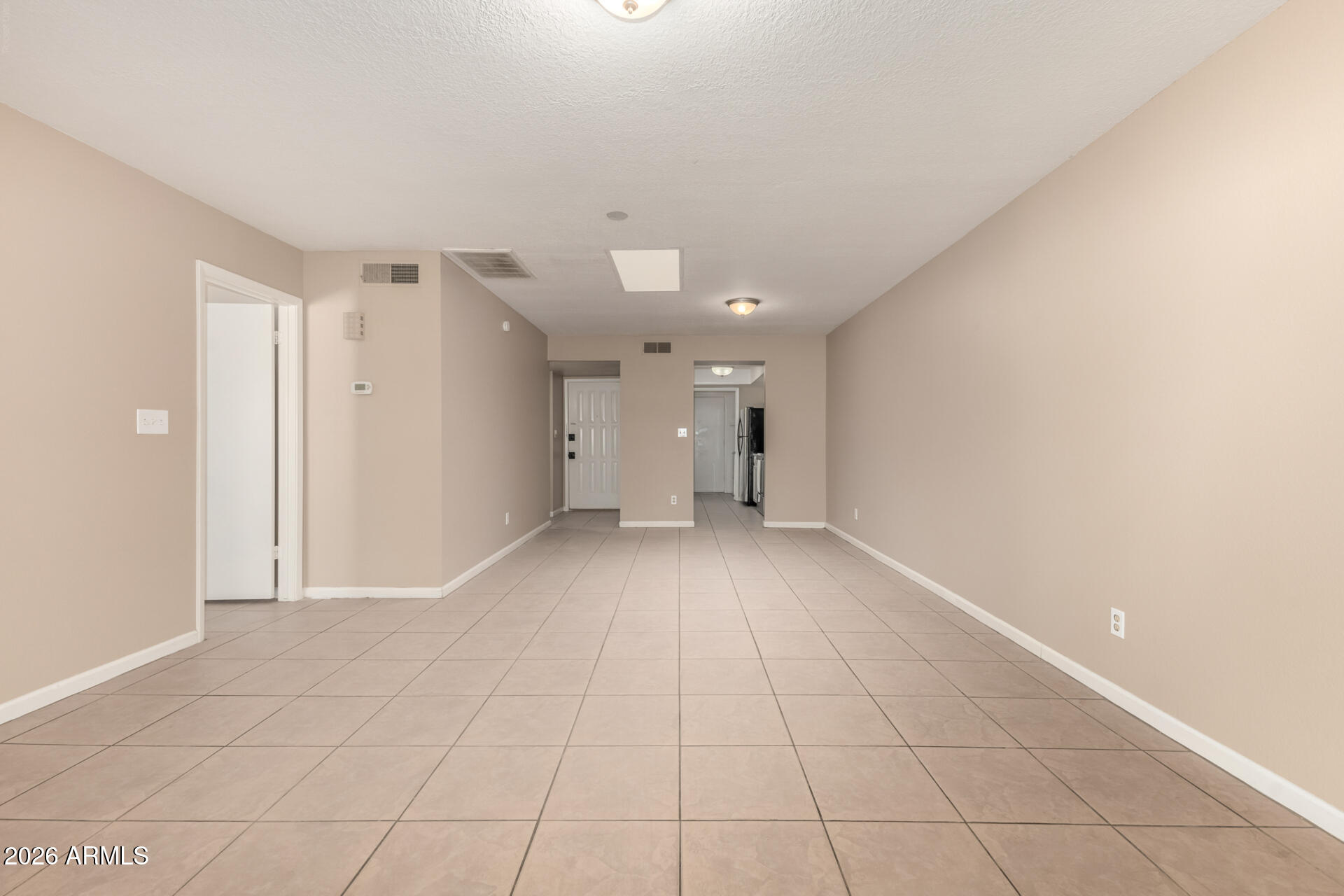 4529 West McLellan Road Glendale, AZ 85301 - Photo 12 of 35 a view of an empty room with a window