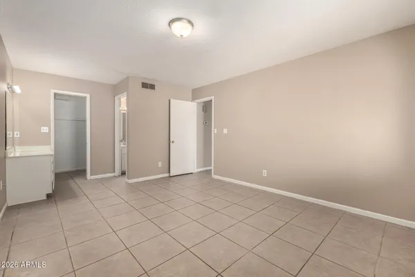 an empty room with windows