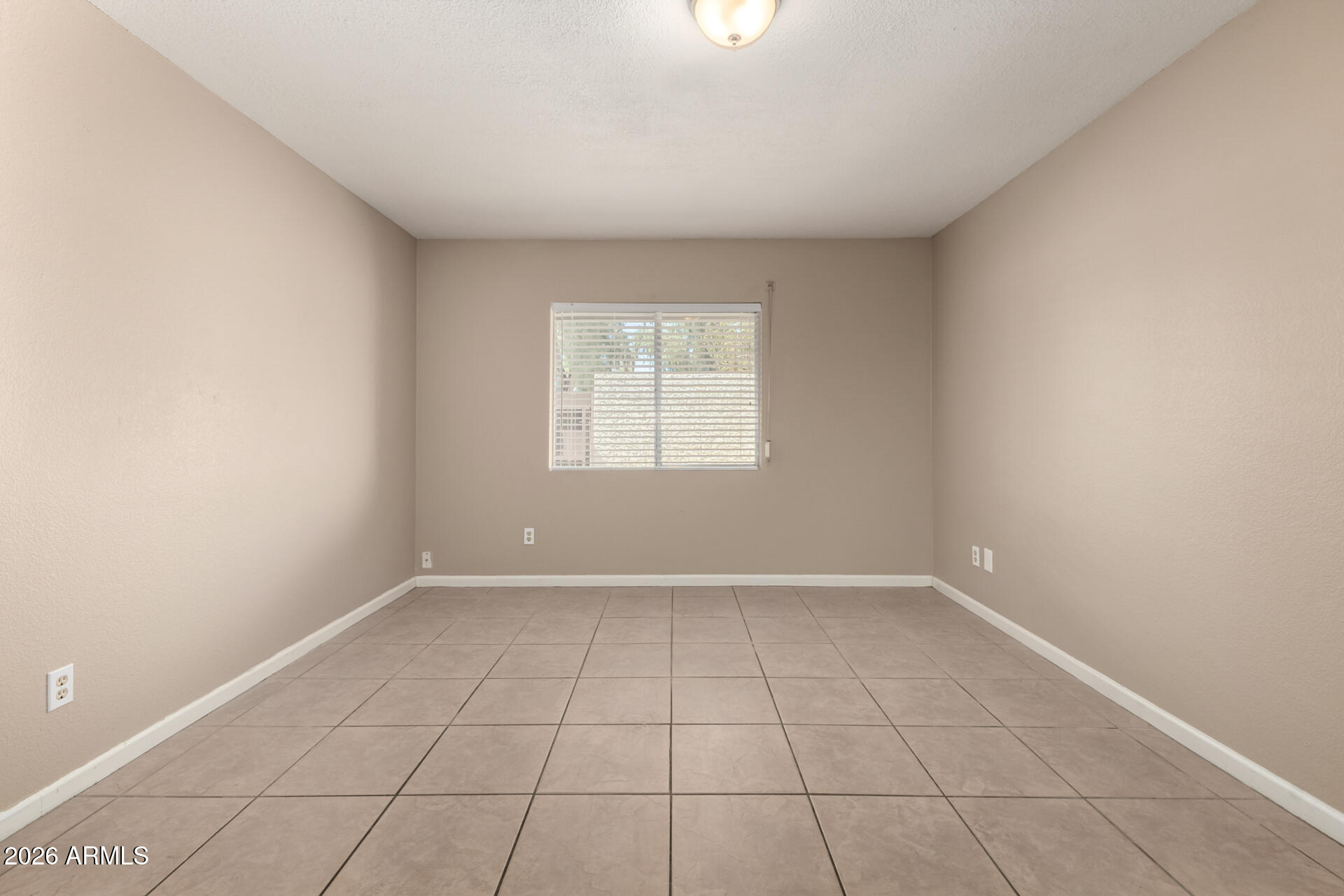 4529 West McLellan Road Glendale, AZ 85301 - Photo 19 of 35 an empty room with windows