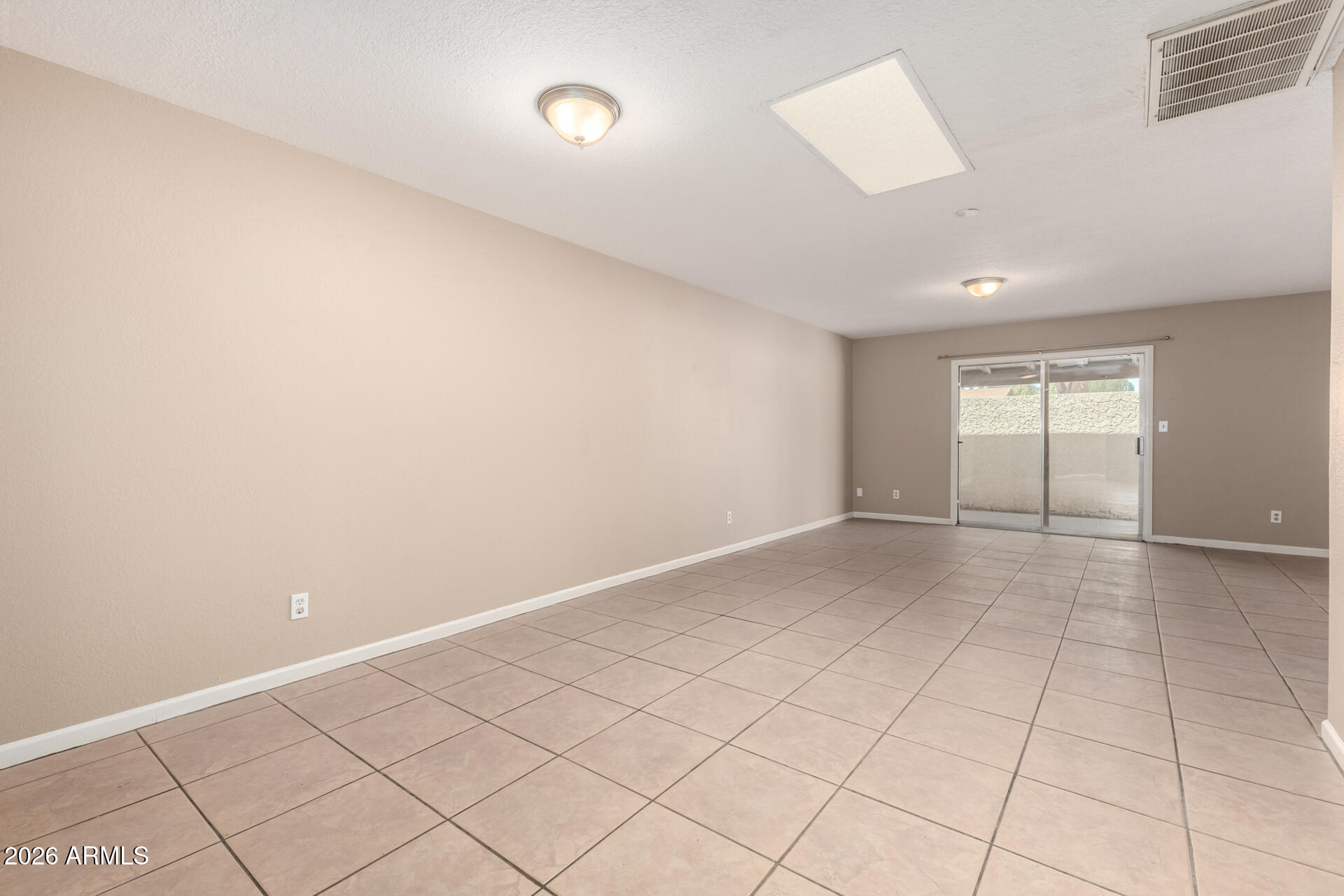 4529 West McLellan Road Glendale, AZ 85301 - Photo 9 of 35 an empty room with windows