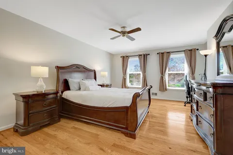 a bed room with a bed and a tv