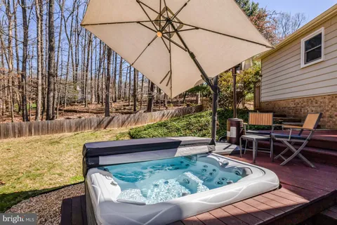 a view of swimming pool with outdoor seating