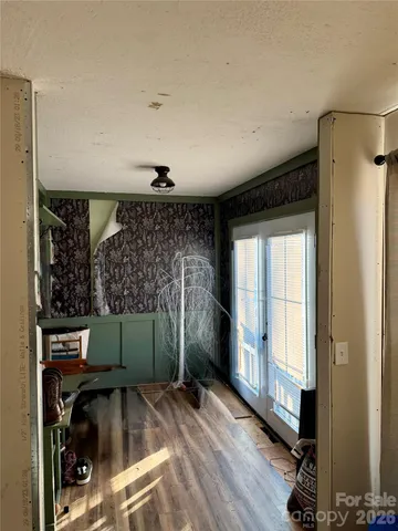 a room with a window and storage space