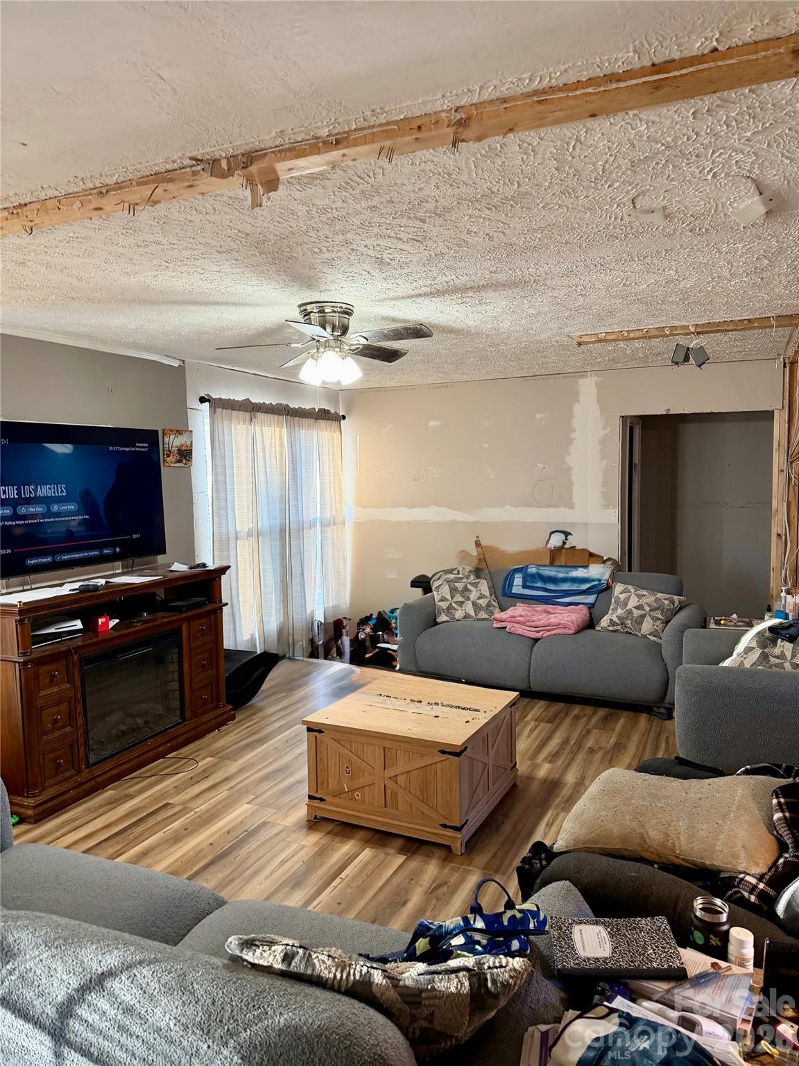 600 Scottdale Road Canton, NC 28716 - Photo 10 of 20 a living room with furniture and a flat screen tv