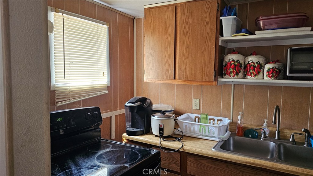 16067 Dam Road Clearlake, CA 95422 - Photo 13 of 30 a room with storage and utility