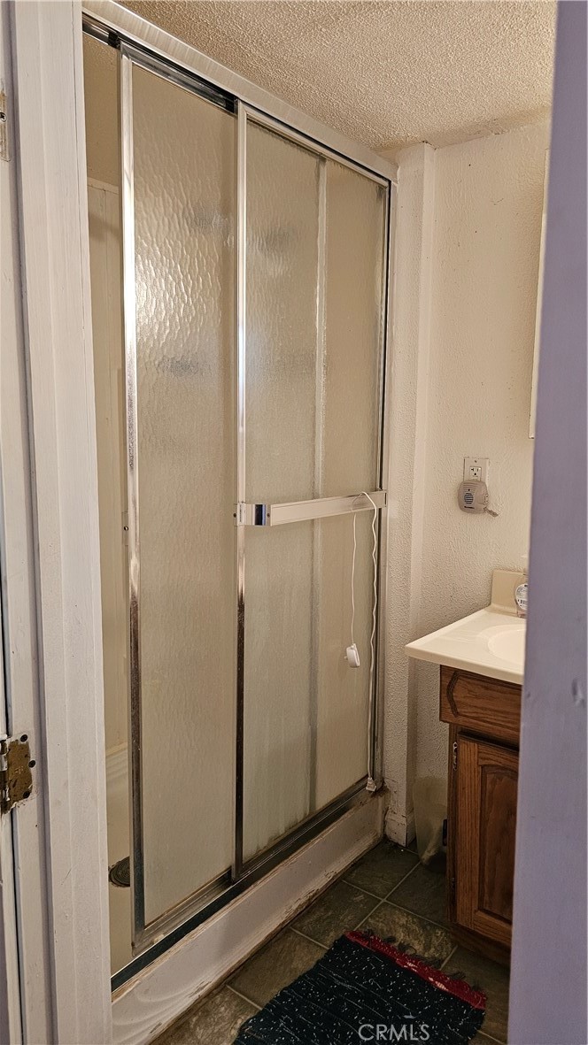 16067 Dam Road Clearlake, CA 95422 - Photo 17 of 30 a bathroom with a shower and a sink