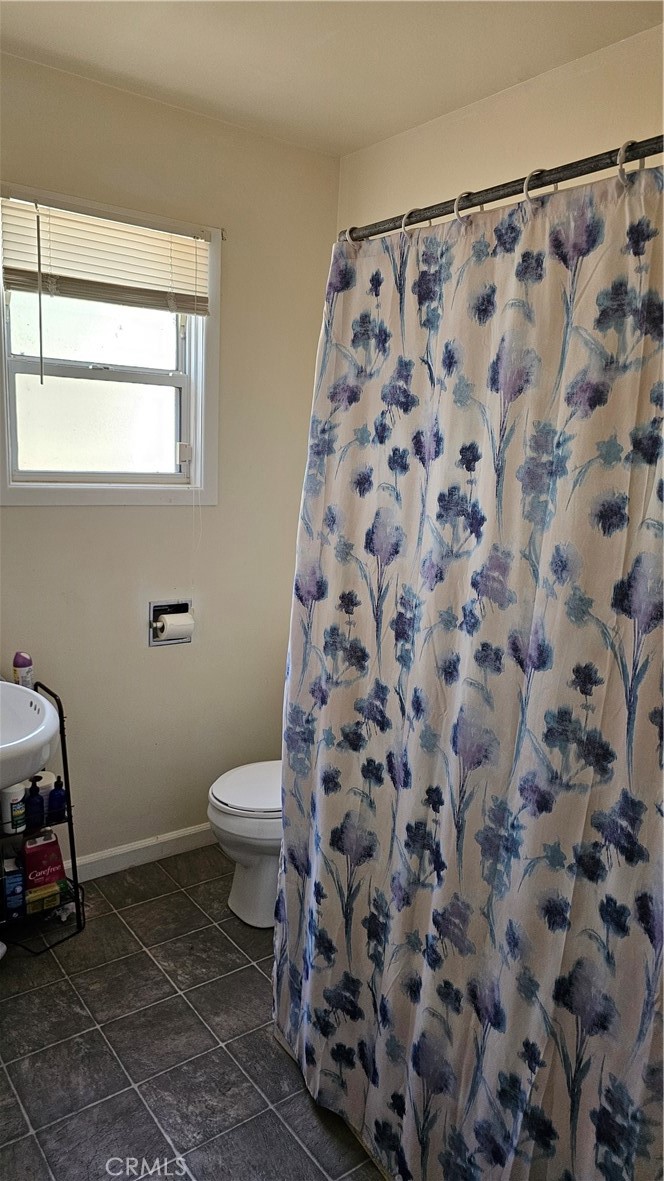 16067 Dam Road Clearlake, CA 95422 - Photo 28 of 30 a bathroom with a sink and a toilet