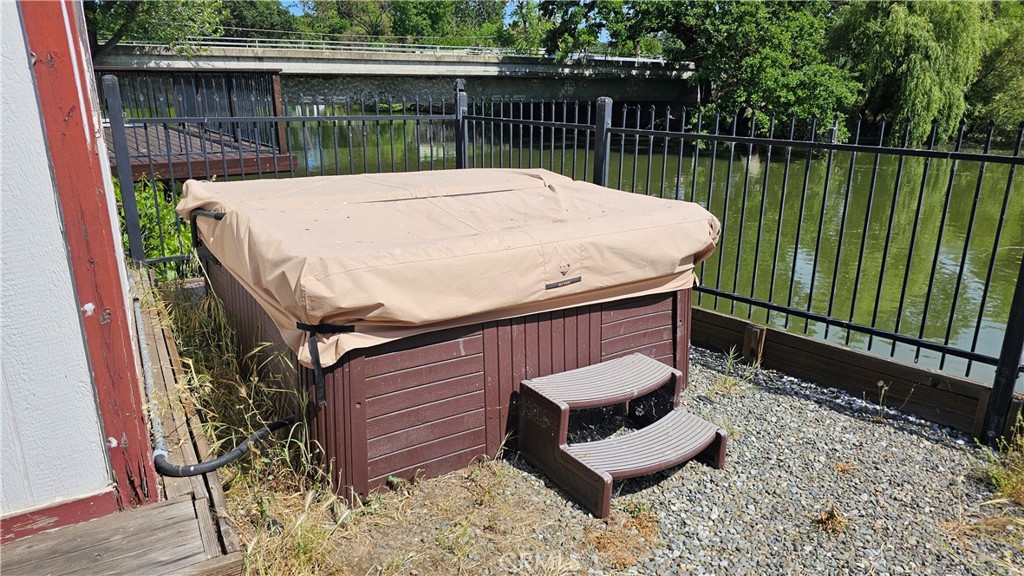16067 Dam Road Clearlake, CA 95422 - Photo 8 of 30 a view of a wooden chairs and table in the back yard