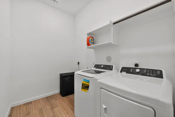 a utility room with dryer and washer
