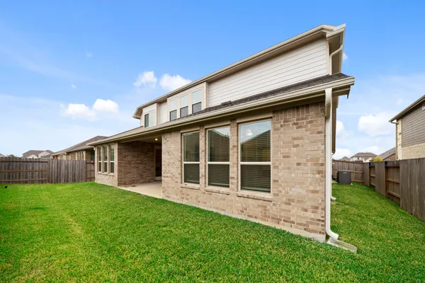 a view of a backyard with a garden