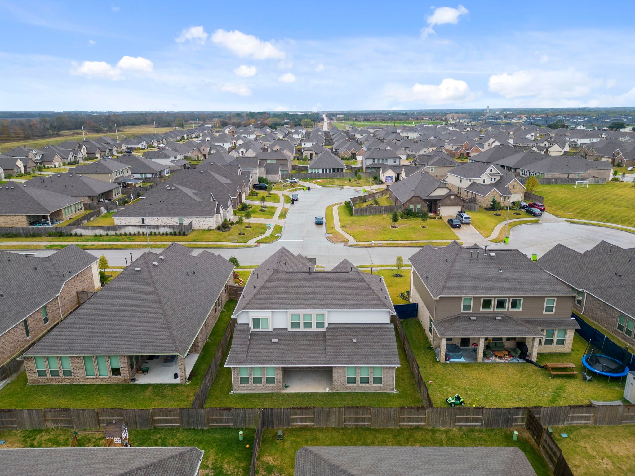 3704 Field Coast Lane Rosenberg, TX 77469 - Photo 6 of 49 Rear aerial view highlighting backyard and neighboring homes