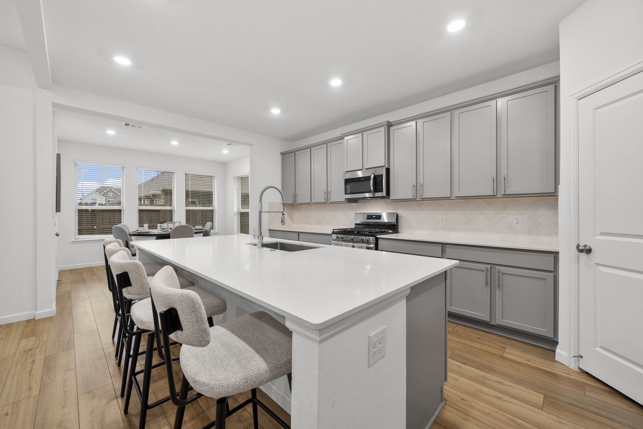 3704 Field Coast Lane Rosenberg, TX 77469 - Photo 8 of 49 Spacious kitchen with large island and bar seating