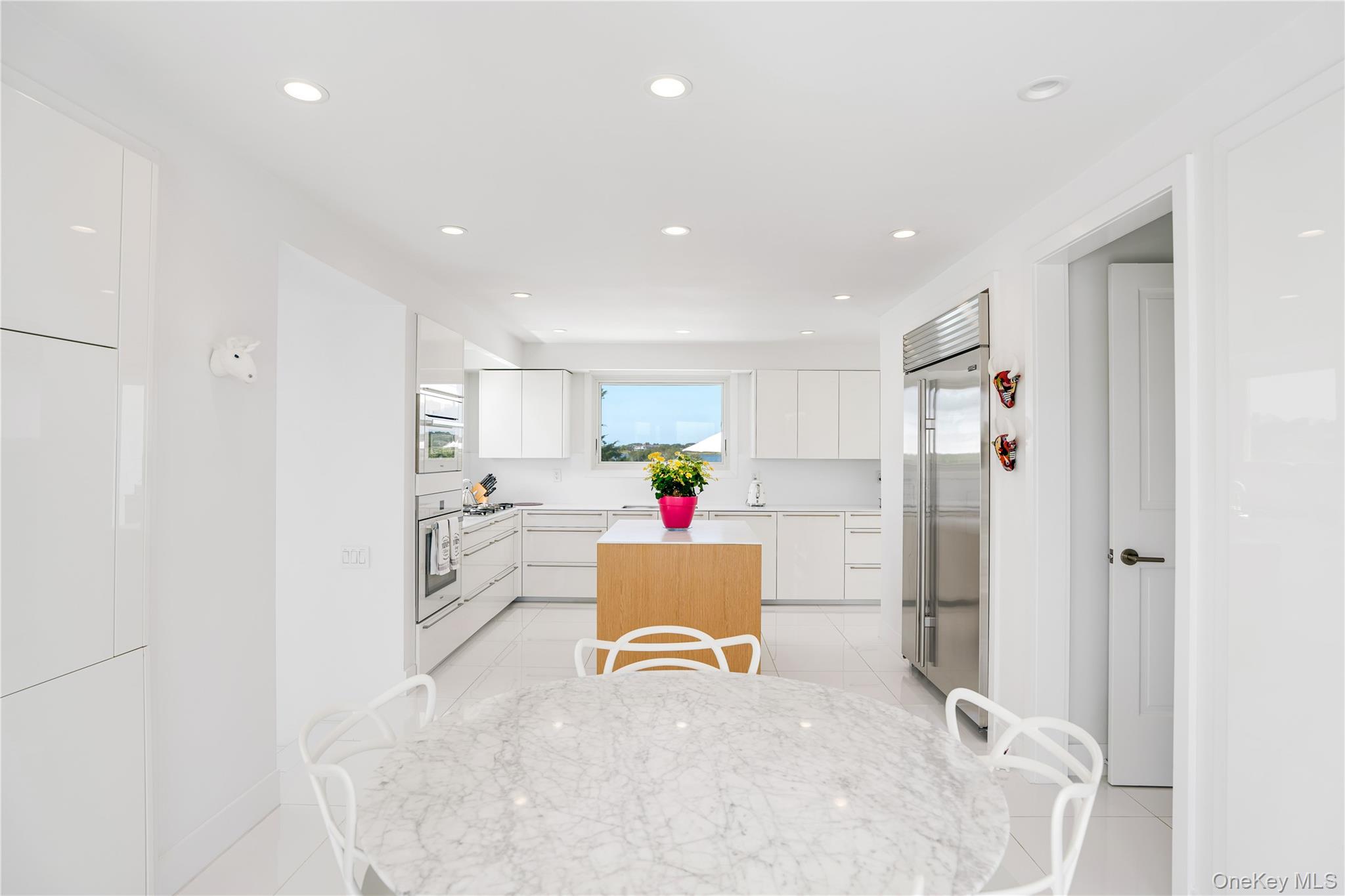 64 West End Road East Hampton, NY 11937 - Photo 13 of 33 a room with furniture and a window