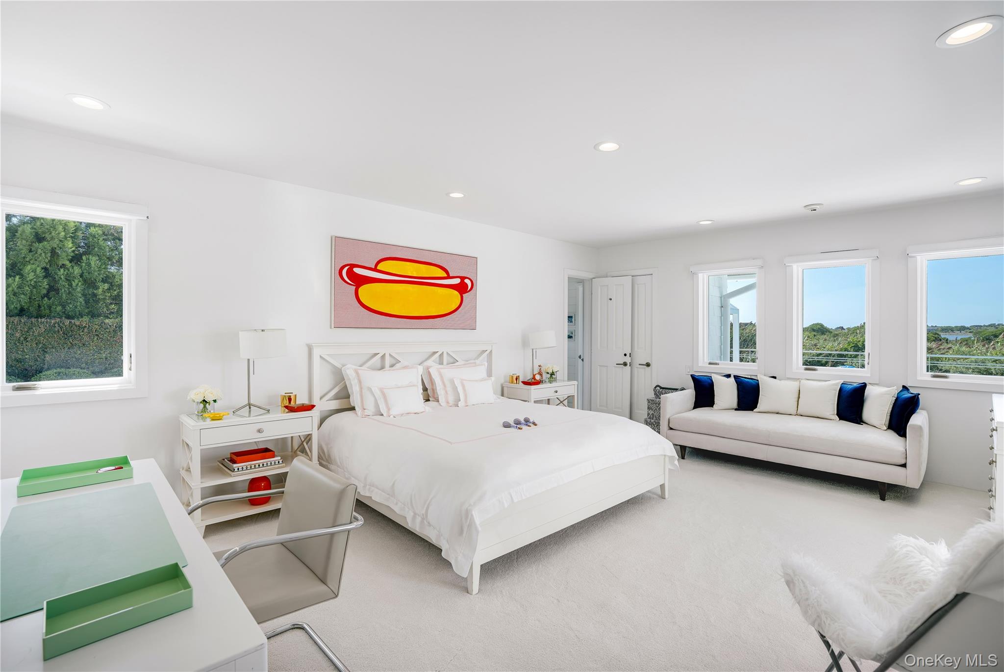 64 West End Road East Hampton, NY 11937 - Photo 22 of 33 a bedroom with a bed and a couch