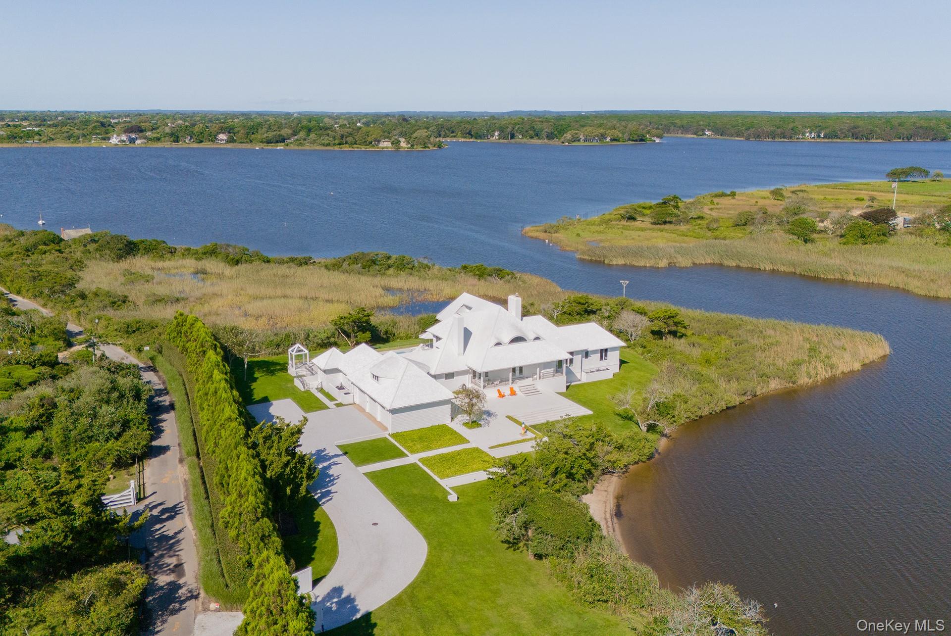 64 West End Road East Hampton, NY 11937 - Photo 28 of 33 an aerial view of ocean with residential house and outdoor space