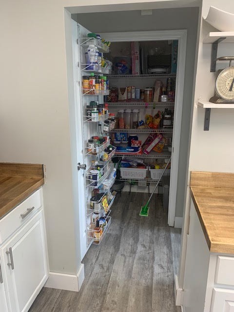 4002 Timber Ridge Court Mount Juliet, TN 37122 - Photo 11 of 37 a view of a kitchen with fridge and rack