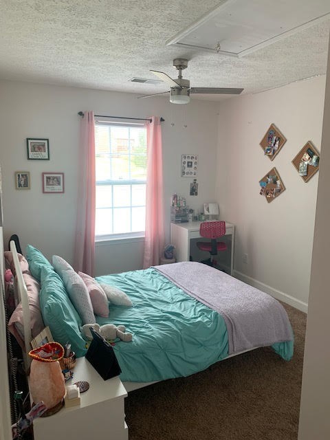 4002 Timber Ridge Court Mount Juliet, TN 37122 - Photo 12 of 37 a bedroom with a bed and window