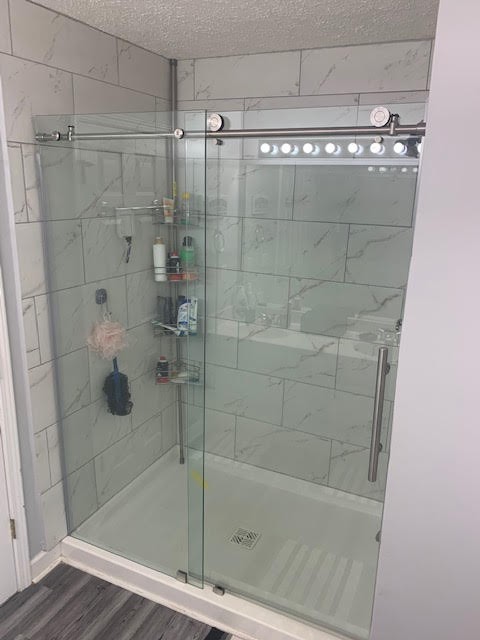 4002 Timber Ridge Court Mount Juliet, TN 37122 - Photo 18 of 37 a bathroom with a shower