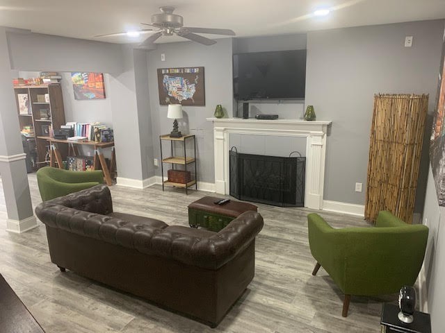 4002 Timber Ridge Court Mount Juliet, TN 37122 - Photo 21 of 37 a living room with furniture and a fireplace